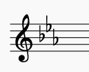 key signature of E flat Major in treble clef. This is also the key signature of C  minor, a relative minor of E flat major.