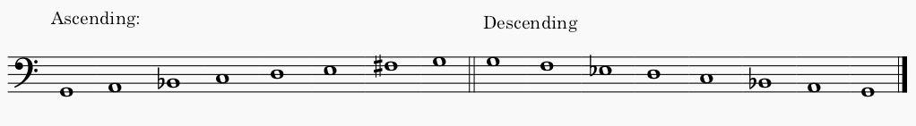 G minor melodic minor scale in bass clef - both ascending and descending scale.
